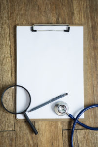 Medical Clipboard to Illustrate Florida Estate Planning and HIPAA Compliance